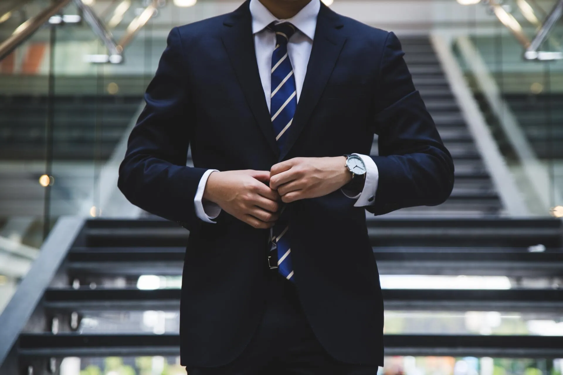 professional adjusting his suit