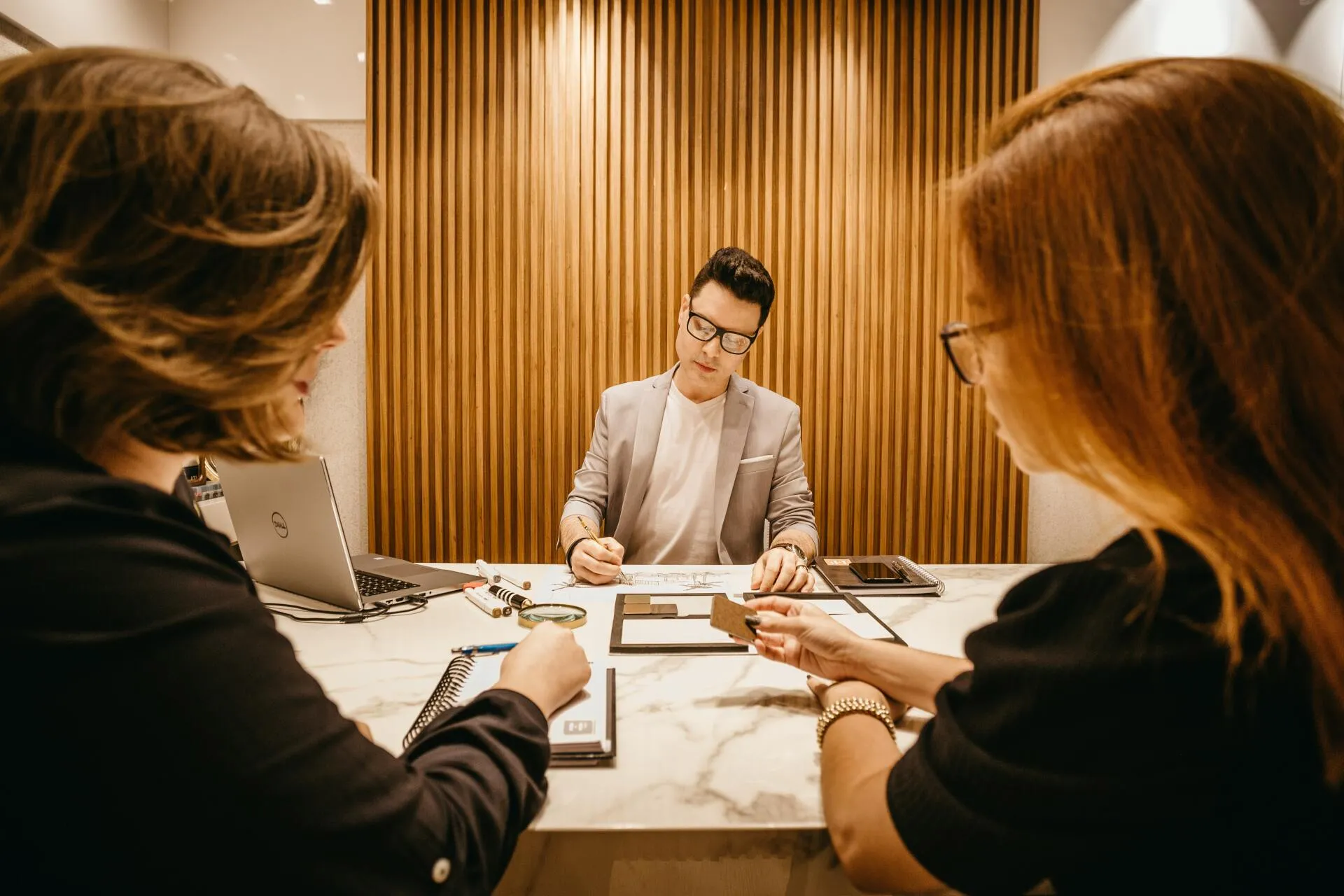 Professionals meeting and reviewing documents