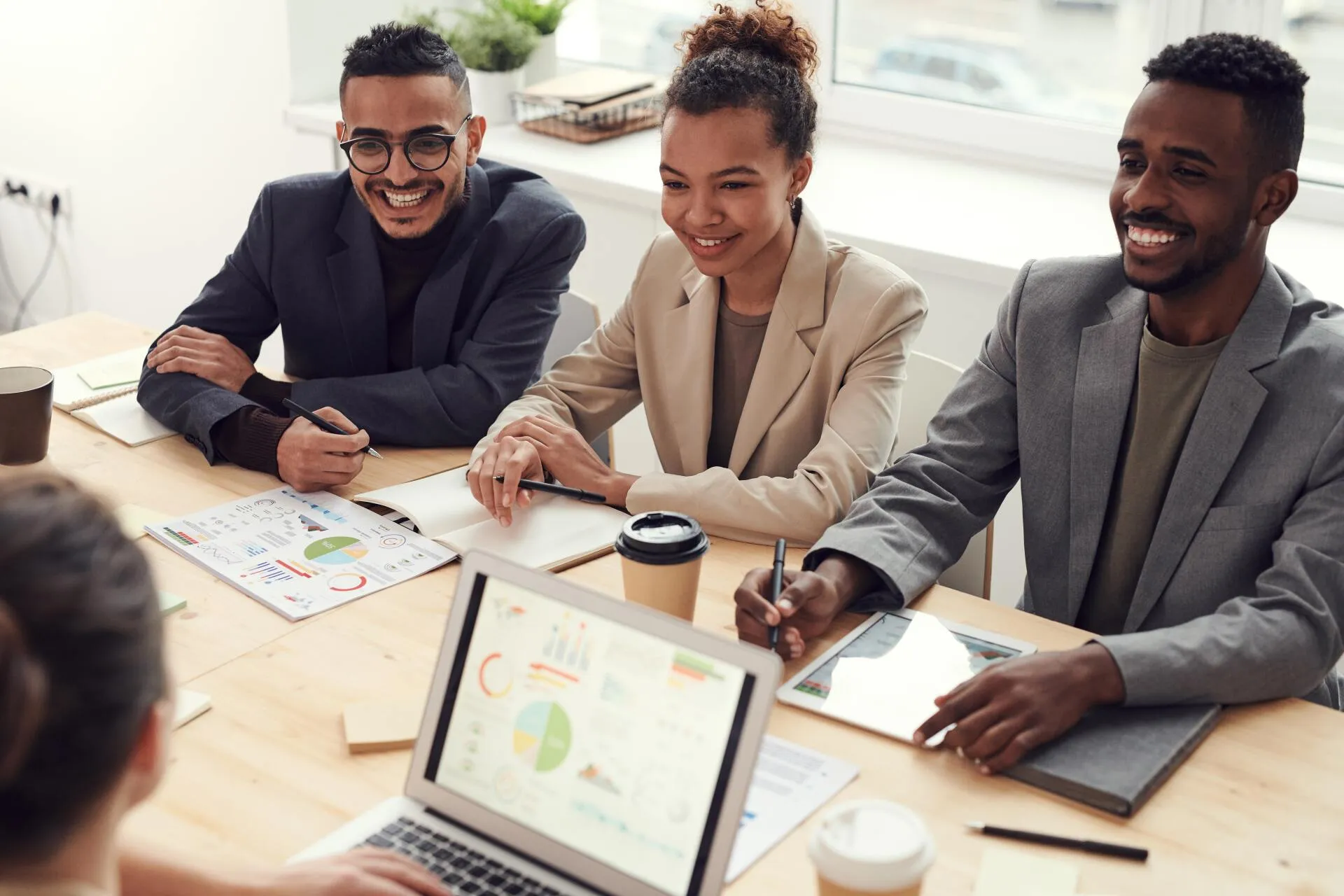 diverse professionals in a meeting together