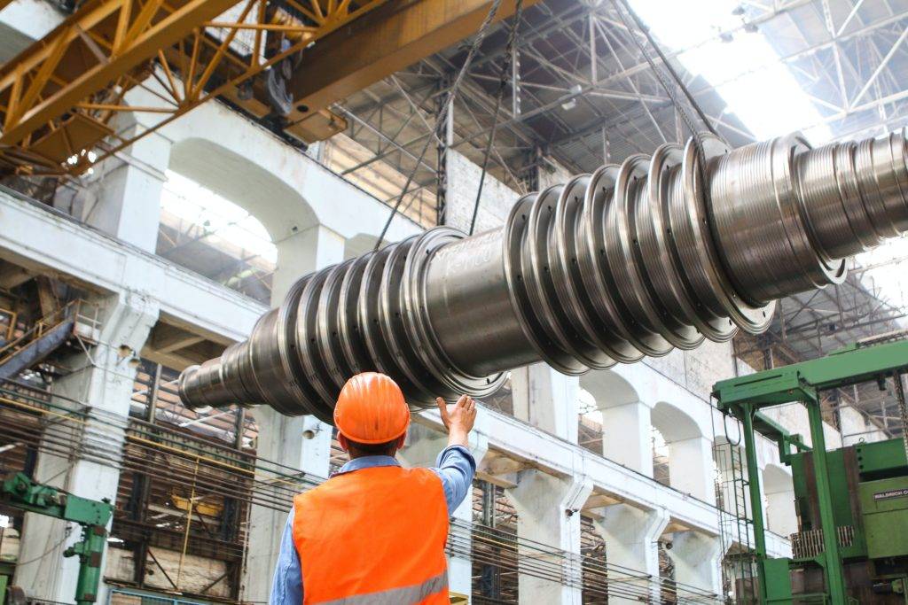 engineer examining machinery